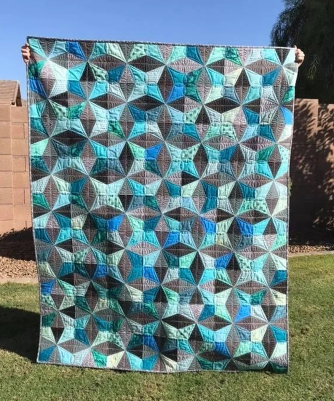 About Us | Quilty