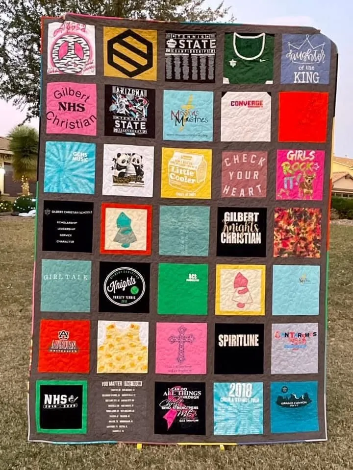 A T-shirt quilt made from school and team shirts