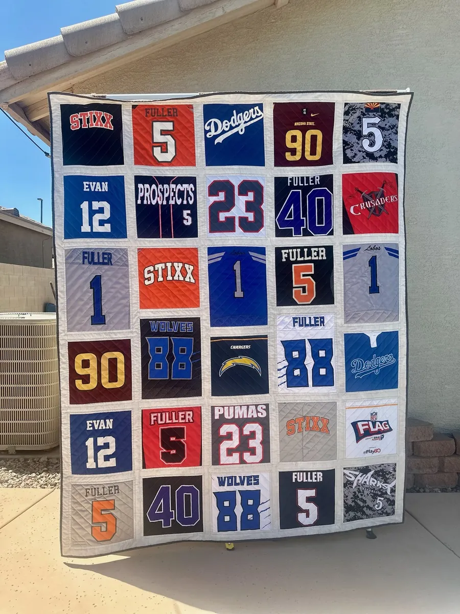 A jersey quilt made from baseball and football jerseys