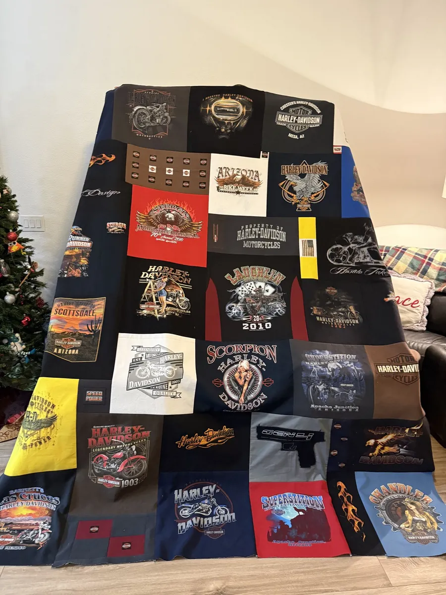 A Harley-Davidson T-shirt quilt with a dark border