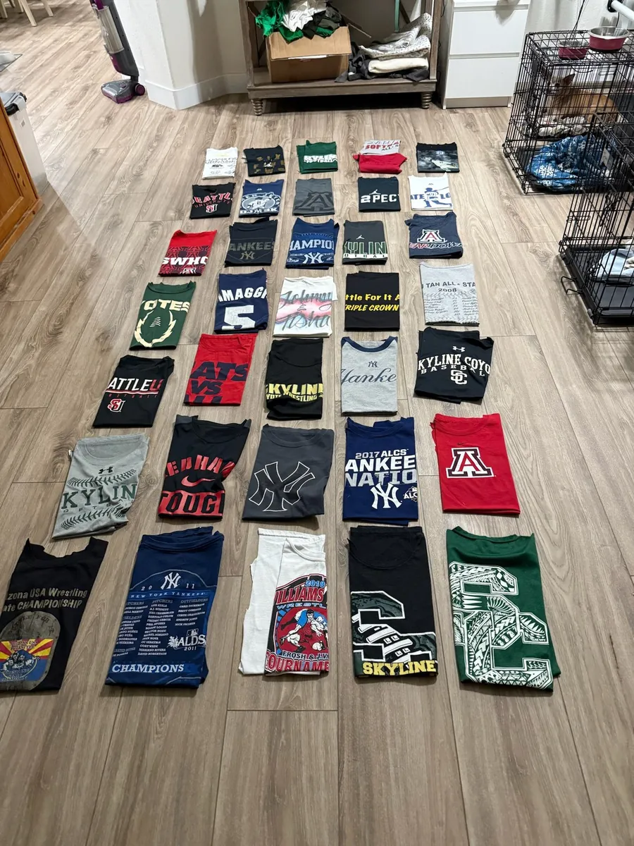 Shirts laid out on my floor before I design the layout