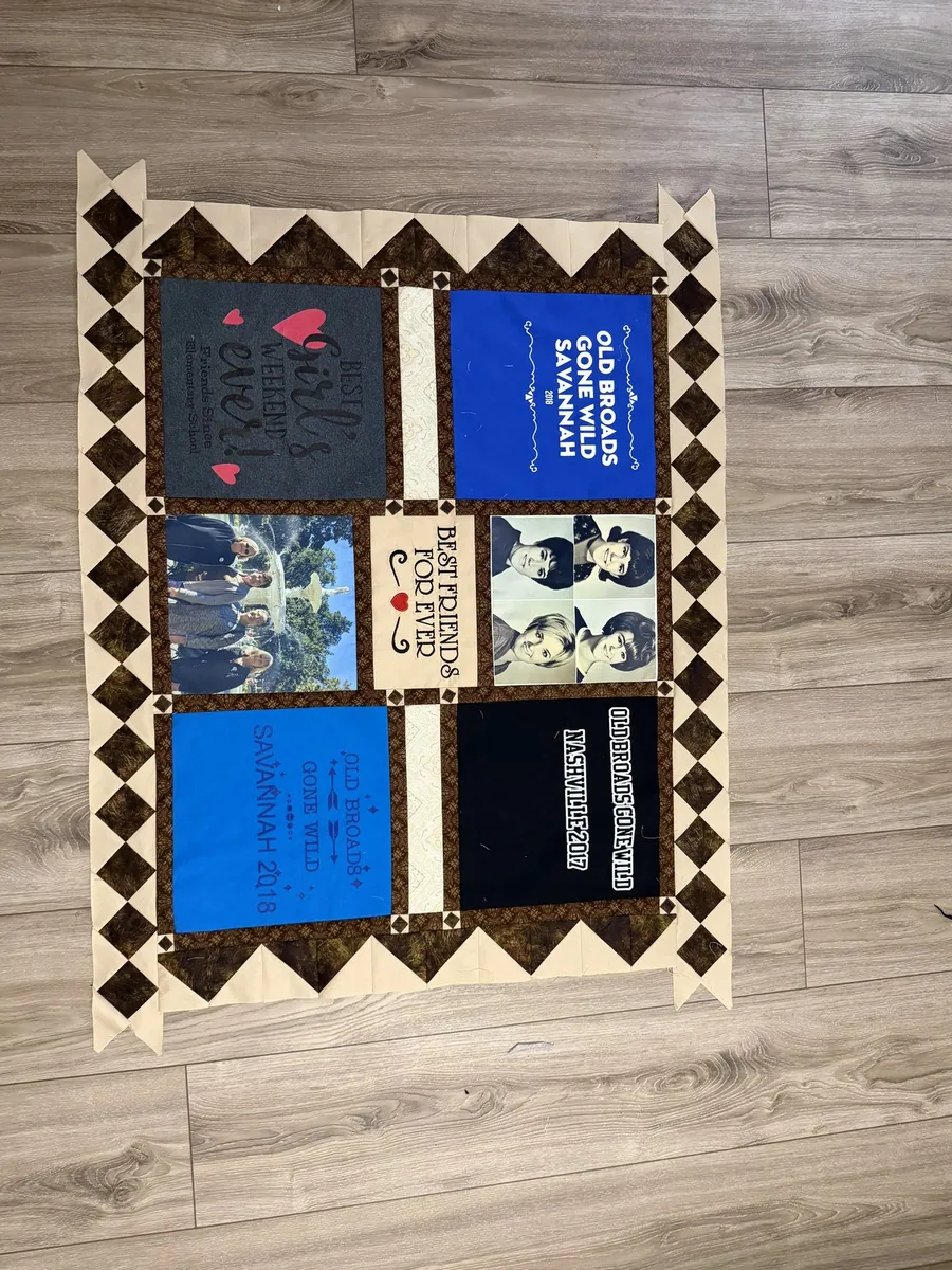 A memory quilt made from T-shirts and photos from a friends' trip